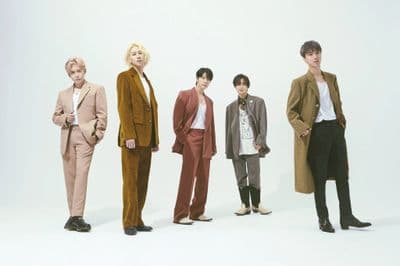 a group of young men standing next to each other