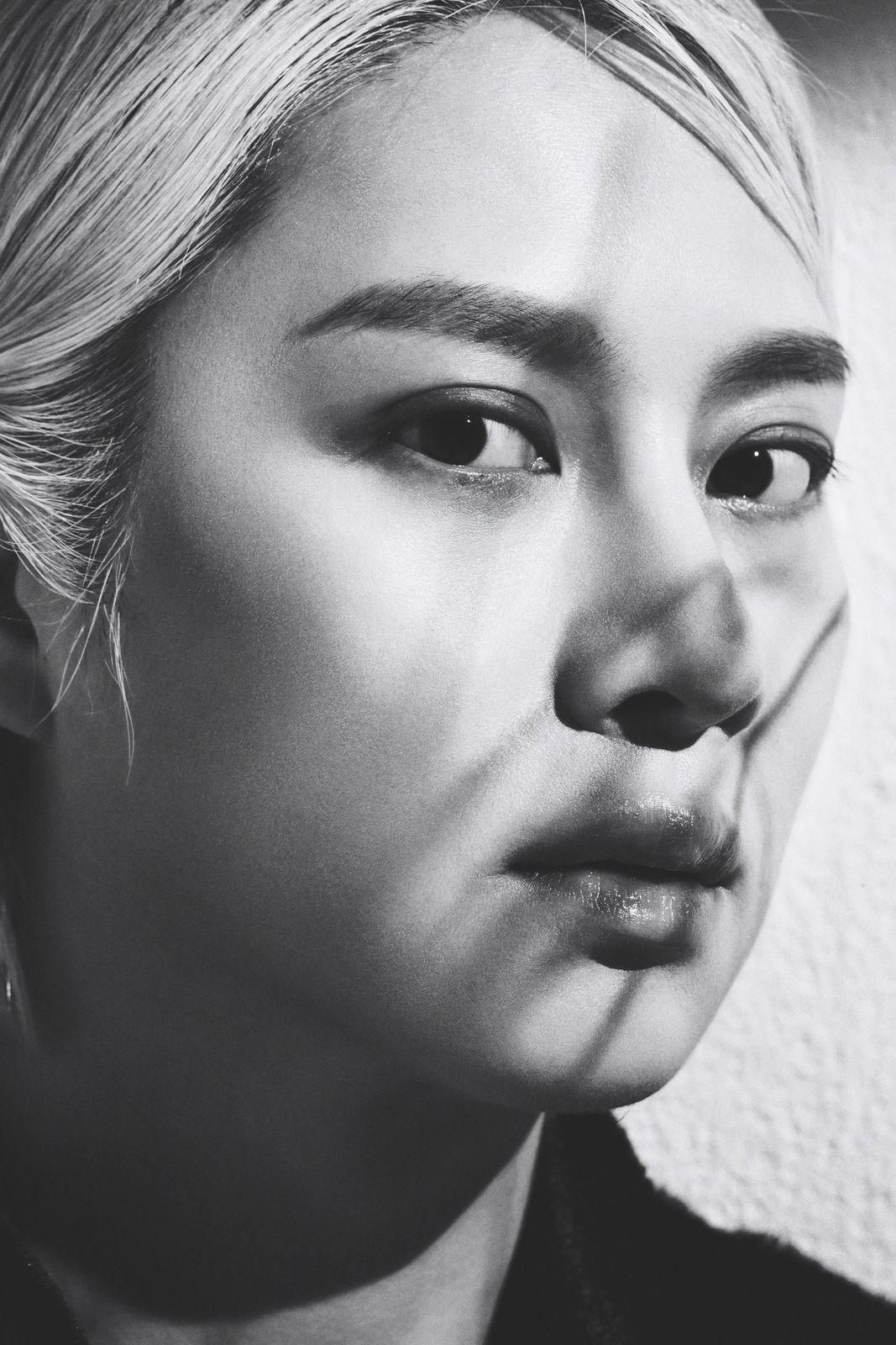 a black and white photo of a woman's face