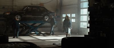 a car being worked on in a garage