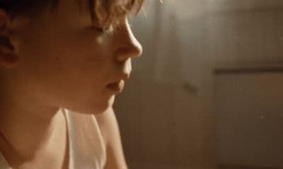 a person with a white shirt and a tie