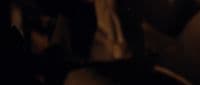 a blurry photo of a person holding a cell phone