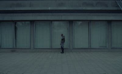 a person standing in front of a building