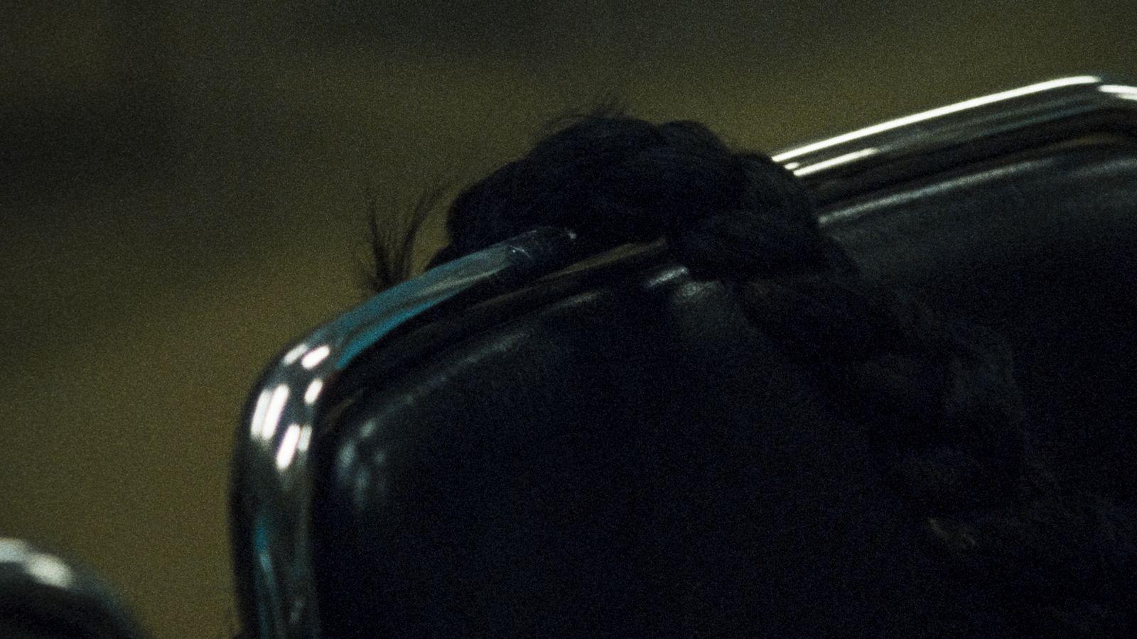 a close up of a black piece of luggage