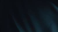 a close up of a cell phone with a blurry background