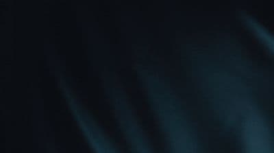 a close up of a cell phone with a blurry background