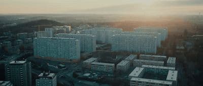 an aerial view of a city with tall buildings