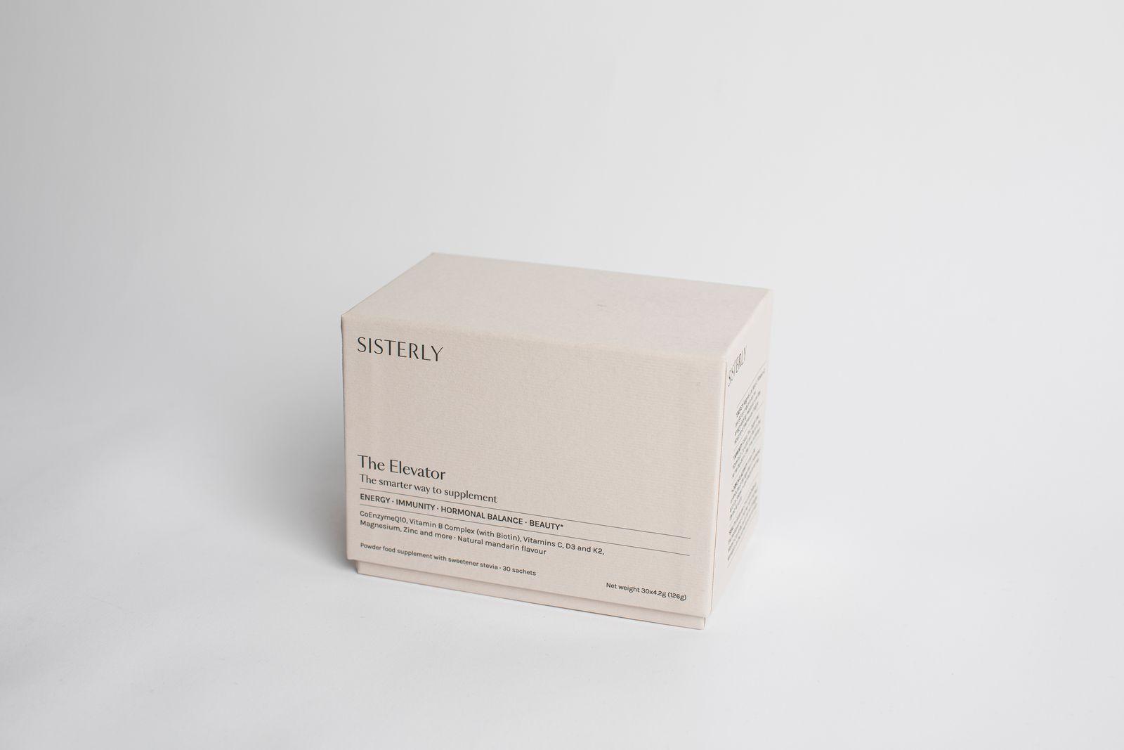 a white box sitting on top of a white table