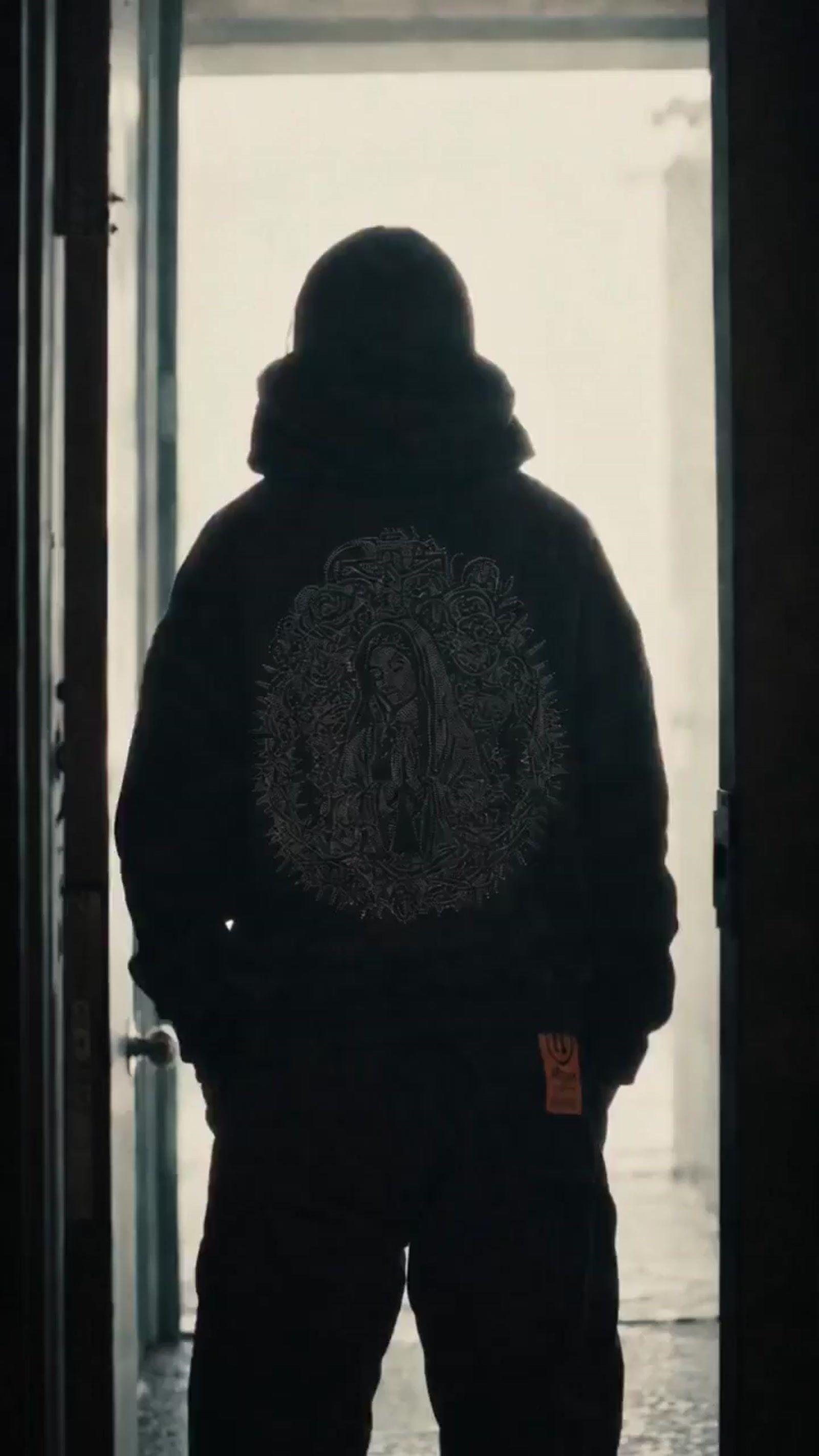 a man standing in front of a doorway