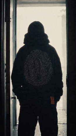 a man standing in front of a doorway