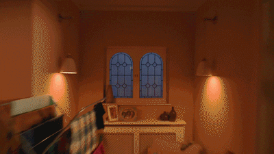 a room with a dresser and two windows
