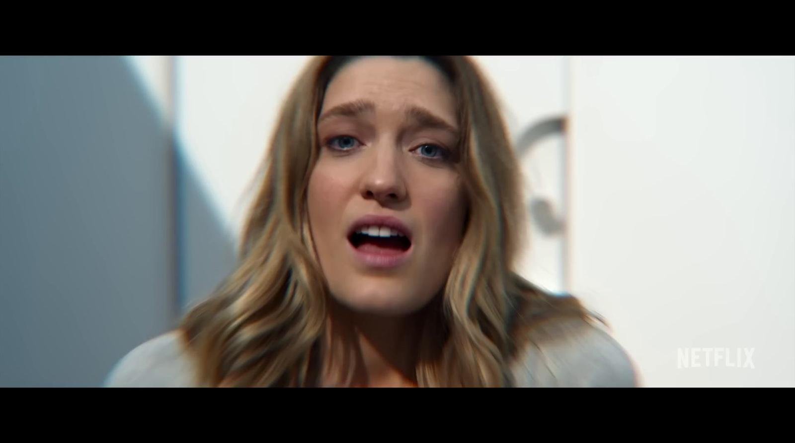 a woman with a surprised look on her face
