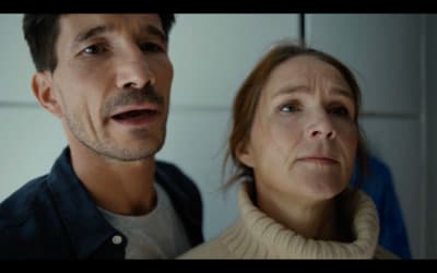 a man and a woman standing next to each other
