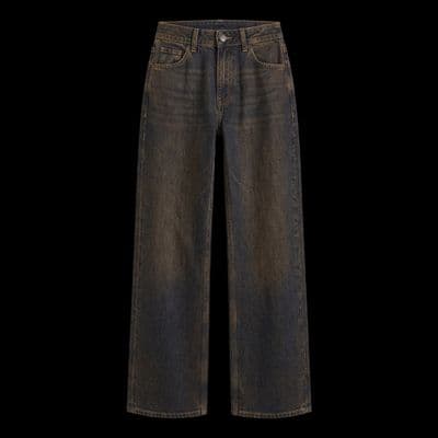 a pair of brown jeans on a black background