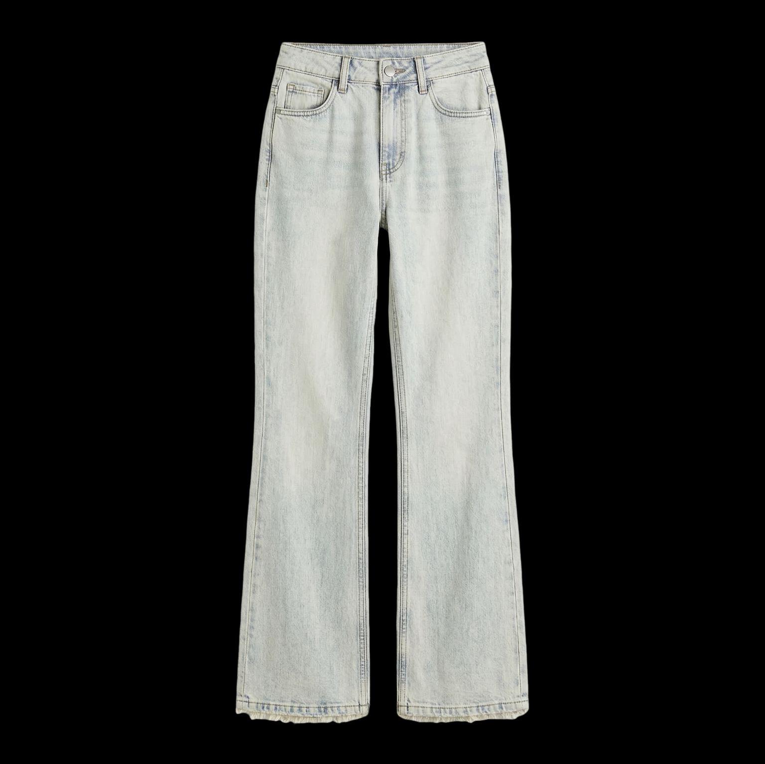 a pair of jeans on a black background