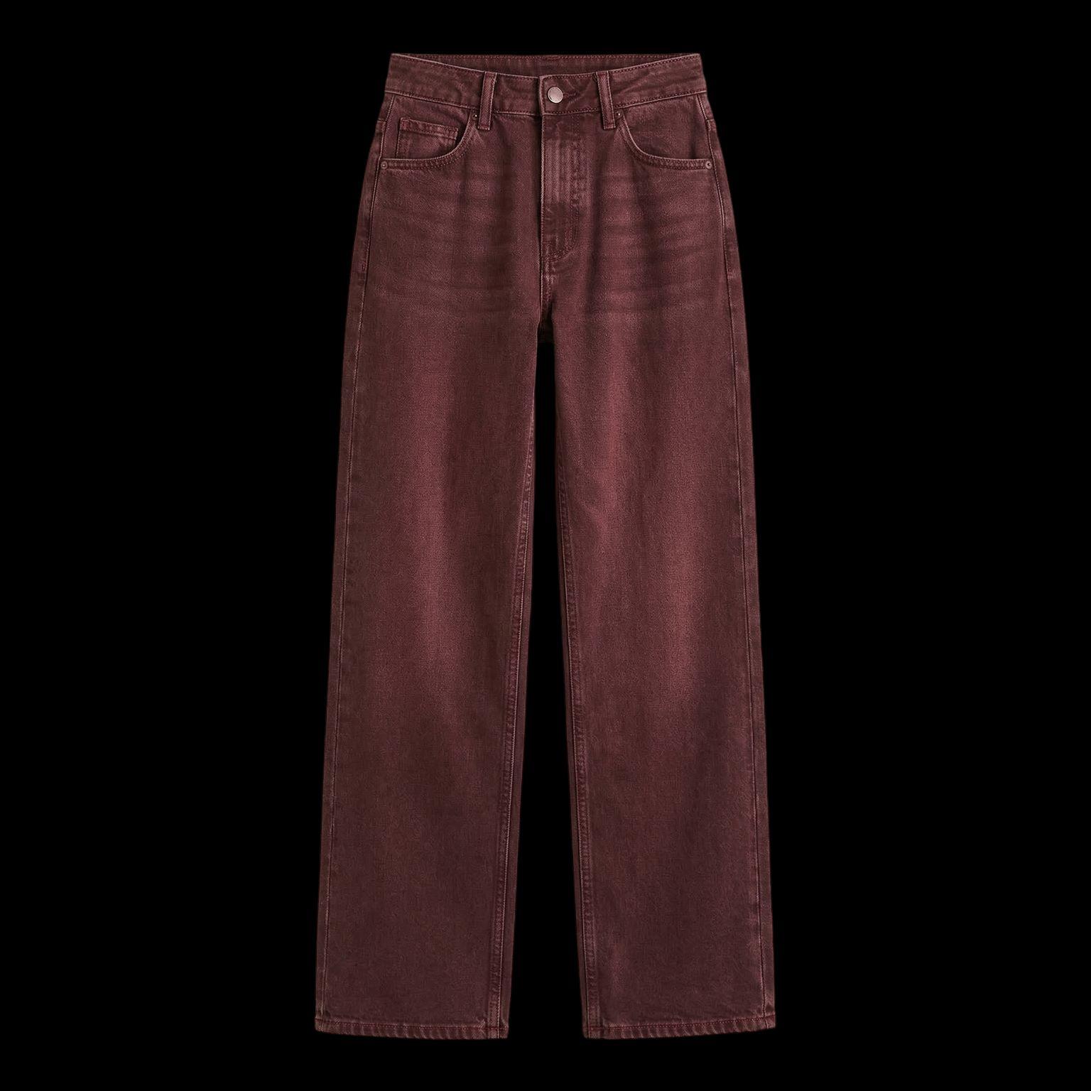 a pair of dark red jeans on a black background
