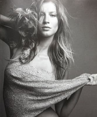 a black and white photo of a woman with long hair
