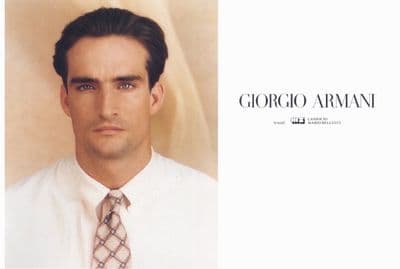a man wearing a white shirt and a tie