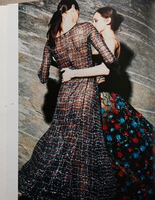 a couple of women standing next to each other
