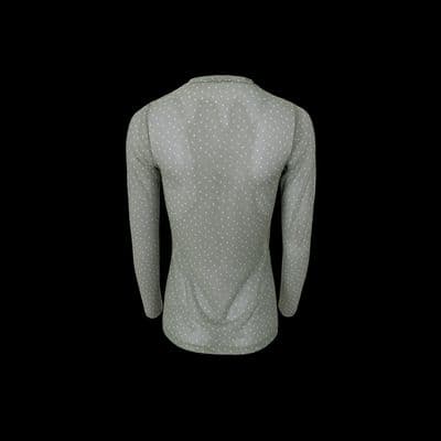 a woman's shirt with a polka dot pattern