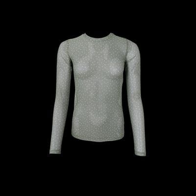 a women's long sleeved shirt with white polka dots