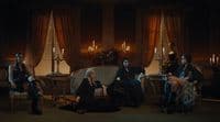 a group of women sitting on top of a couch