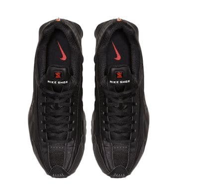 a pair of black and red nike sneakers