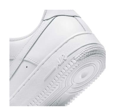 a pair of white sneakers on a white background