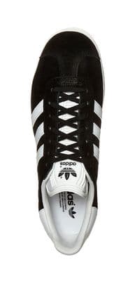 a black and white adidas sneakers on a white background