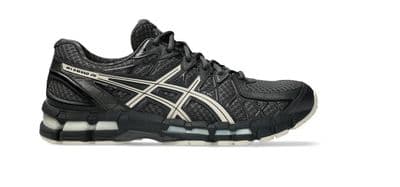 a black and white running shoe on a white background