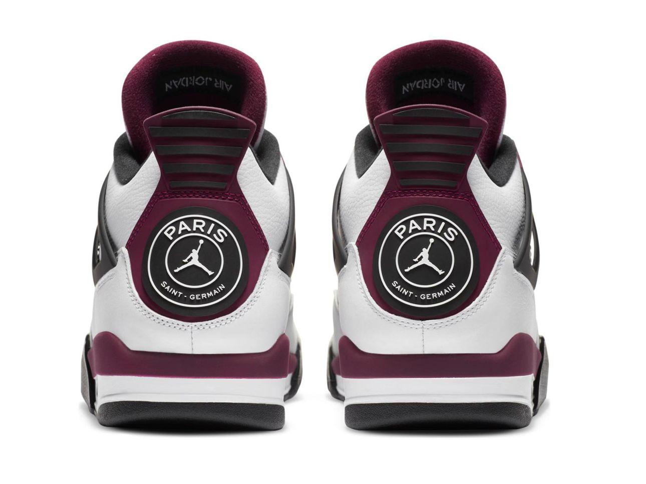 a pair of white and maroon sneakers on a white background
