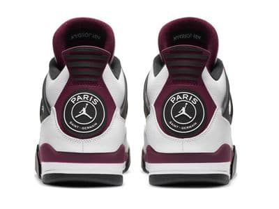 a pair of white and maroon sneakers on a white background