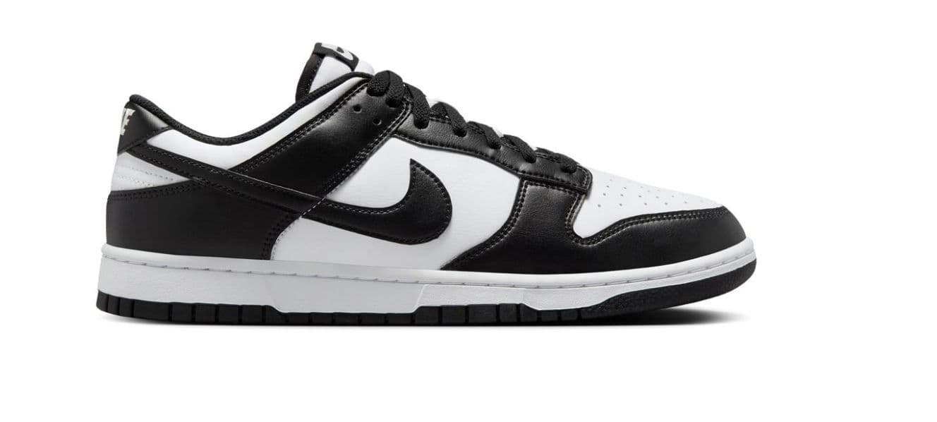 a black and white shoe on a white background