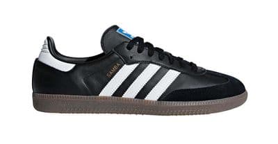 a black and white adidas sneakers on a white background