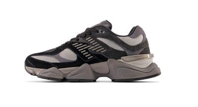 a black and grey sneaker on a white background