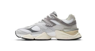 a white and grey sneaker on a white background