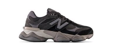a black and grey sneaker on a white background