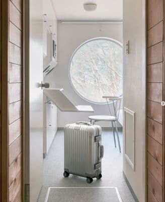 a piece of luggage sitting in a hallway