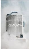 a piece of luggage sitting on top of a cloud covered ground
