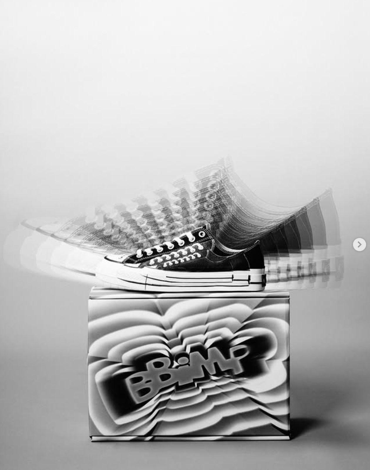 a pair of shoes sitting on top of a box