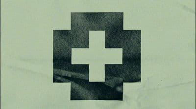 a black and white picture of a cross on a piece of paper