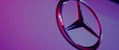 a close up of a mercedes emblem on a car