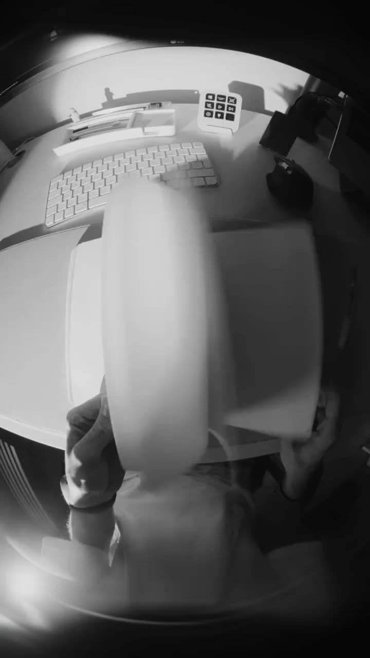 a computer monitor sitting on top of a desk