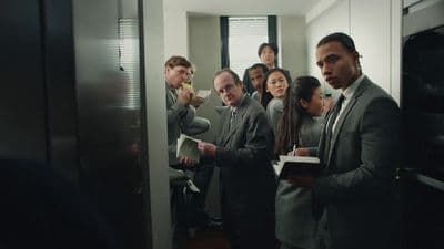 a group of people standing in a room