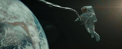 an astronaut floating in space next to the earth
