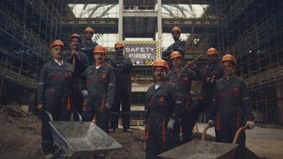 a group of men standing next to each other