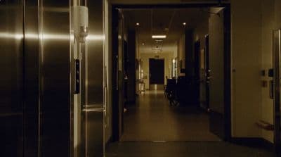a long hallway leading to an office building