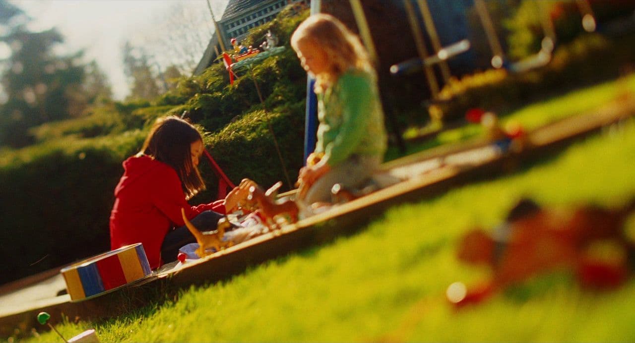 a group of children playing in a park