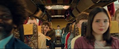 a group of people riding on a bus