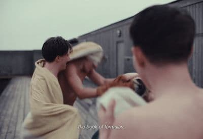a couple of men standing next to each other