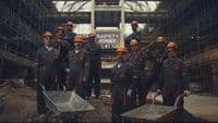 a group of men standing next to each other